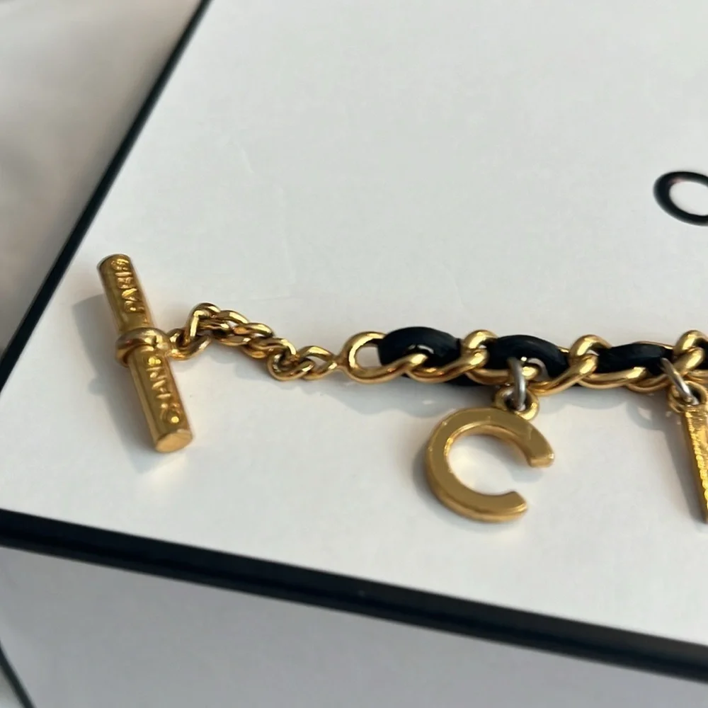 CHANEL RARE VINTAGE TOGGLE LEATHER CHARM BRACELET